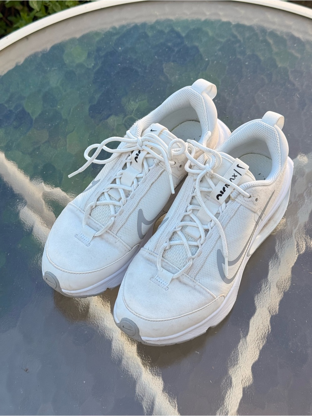 Nike White Athletic Sneakers with Light Gray Swoosh